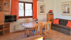 Living room in the apartment East at the farm Koflerhof