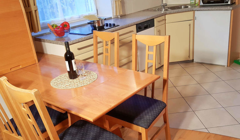 Wohnzimmer in der Ferienwohnung West am Koflerhof